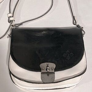 Patricia Nash leather crossbody purse in a black and white colorblock